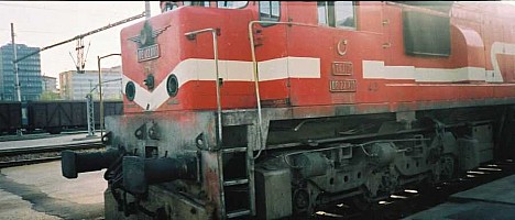 The cab end and bogie of DE22001. This close up pictures shows the TCDD logo on the nose of the engine. This deco seems to be specific to this particular unit. July 2001. photo Gökçe Aydın